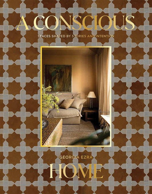 Book cover of 'A Conscious Home' by Georgia Ezra with a patterned background and interior design image.